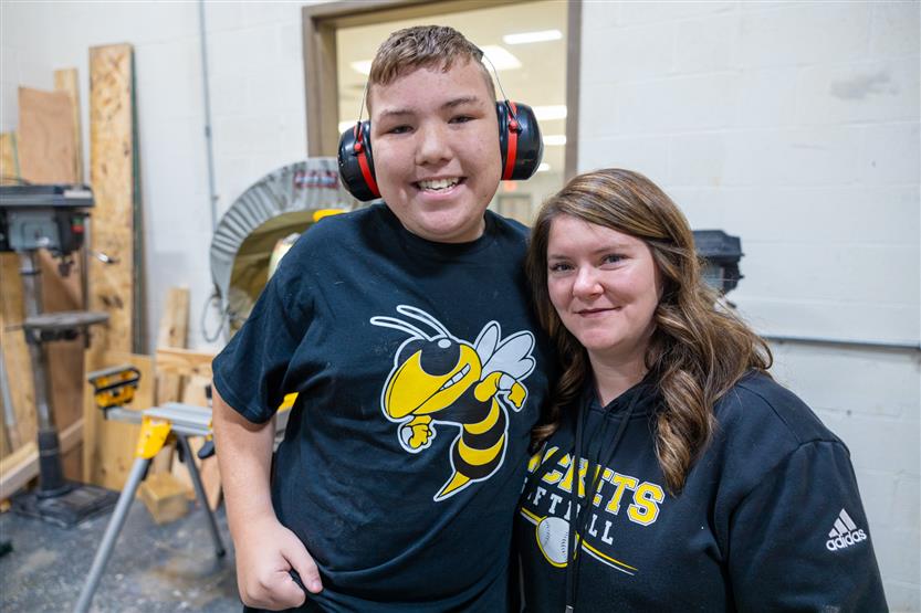 Students build doghouses